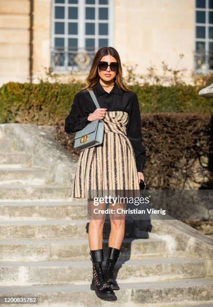 Negin Mirsalehi seen wearing dress, bag outside Dior during Paris Fashion Week - Haute Couture Spring/Summer 2020 on January 20, 2020 in Paris,...