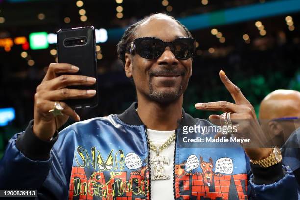 Rapper Snoop Dogg courtside before the game between the Boston Celtics and the Los Angeles Lakers at TD Garden on January 20, 2020 in Boston,...