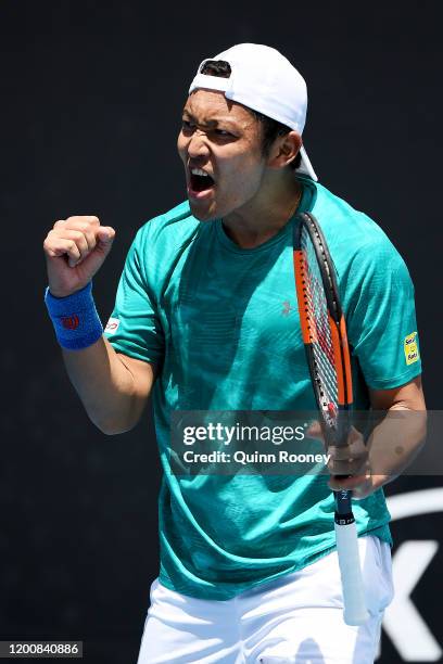 Tatsuma Ito of Japan celebrates after winning match point during his Men's Singles first round match against Prajnesh Gunneswaran of India on day two...