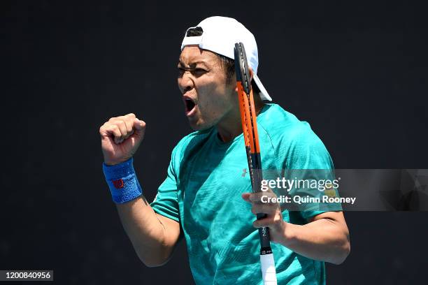 Tatsuma Ito of Japan celebrates after winning match point during his Men's Singles first round match against Prajnesh Gunneswaran of India on day two...