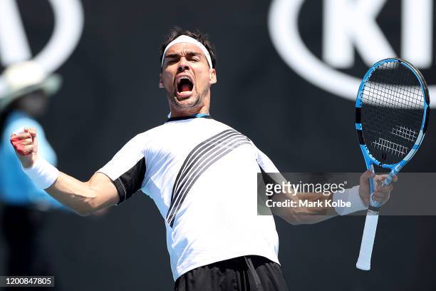 Fabio Fognini of Italy celebrates after winning match point during his Men's Singles first round match against Reilly Opelka of the United States on...
