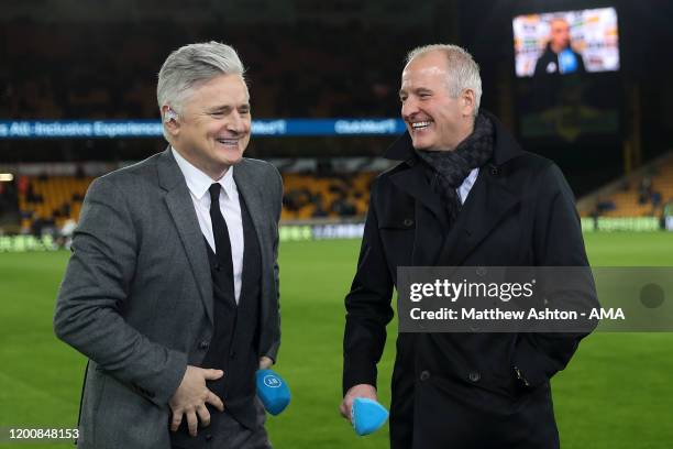 Des Kelly of BT Sport shares a joke with Steve Bull of Wolverhampton Wanderers during the Premier League match between Wolverhampton Wanderers and...