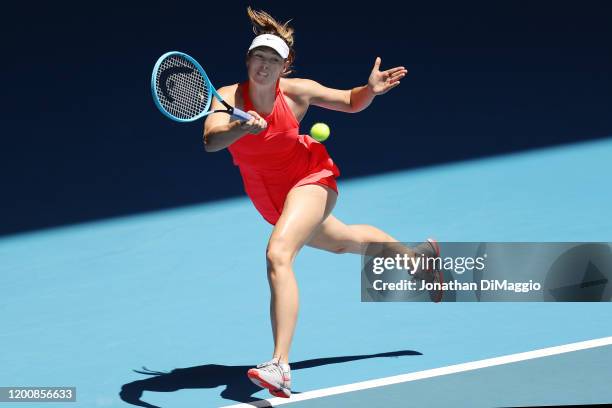 Maria Sharapova of Russia plays a forehand in her first round match against Donna Vekic of Croatia on day two of the 2020 Australian Open at...