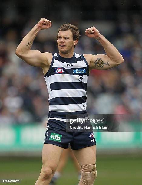 Cameron Mooney of the Cats celebrates a goal during the round 19 AFL match between the Geelong Cats and the Melbourne Demons at Skilled Stadium on...