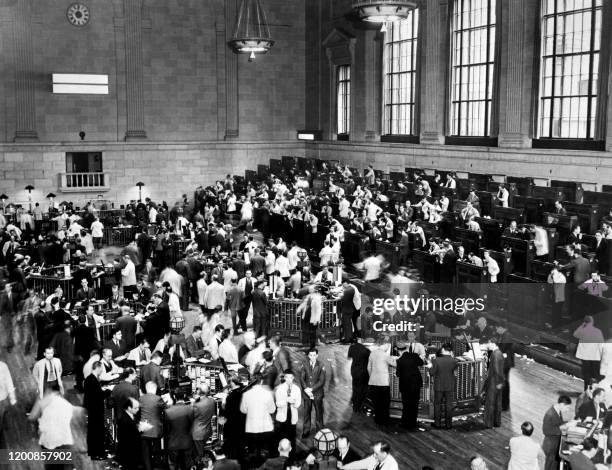 Traders rush October in Wall Street as New York Stock Exchange crashed sparking a run on banks that spread accross the country. October 1929 was the...