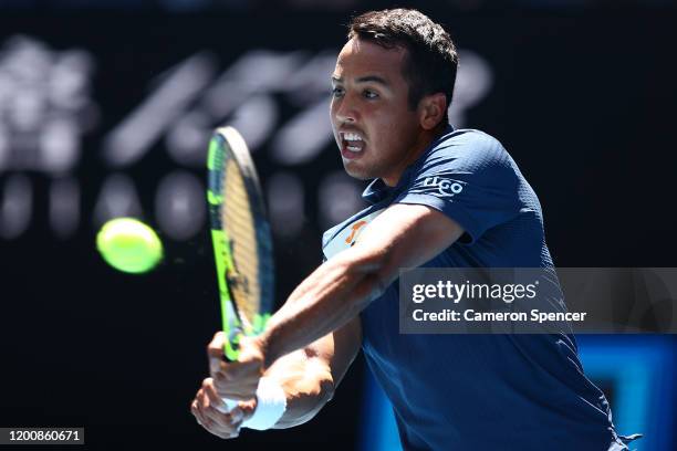 Hugo Dellien of Bolivia plays a backhand during his Men's Singles first round match against Rafael Nadal of Spain on day two of the 2020 Australian...