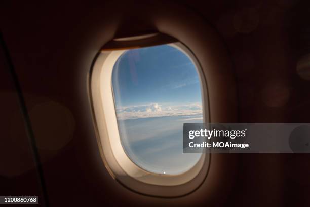airplane window - port hole stock pictures, royalty-free photos & images