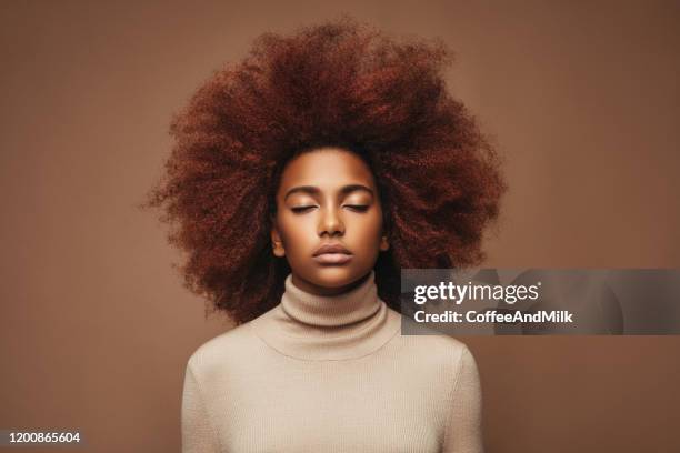 photo of young curly girl - curly brown hair stock pictures, royalty-free photos & images