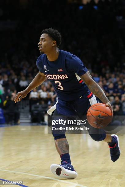 Alterique Gilbert of the Connecticut Huskies in action against the Villanova Wildcats during a college basketball game at Wells Fargo Center on...