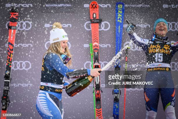 Alice Robinson of New Zealand celebrates on podium after winning the Audi FIS Alpine Skiing World Cup Giant Slalom race in Kranjska Gora, Slovenia on...
