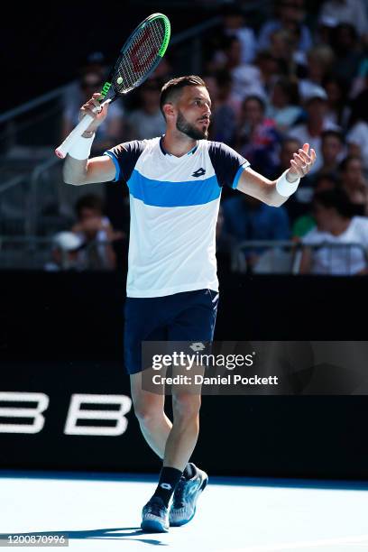 Damir Dzumhur of Bosnia and Herzegovina reacts during his Men's Singles first round match against Stan Wawrinka of Switzerland on day two of the 2020...