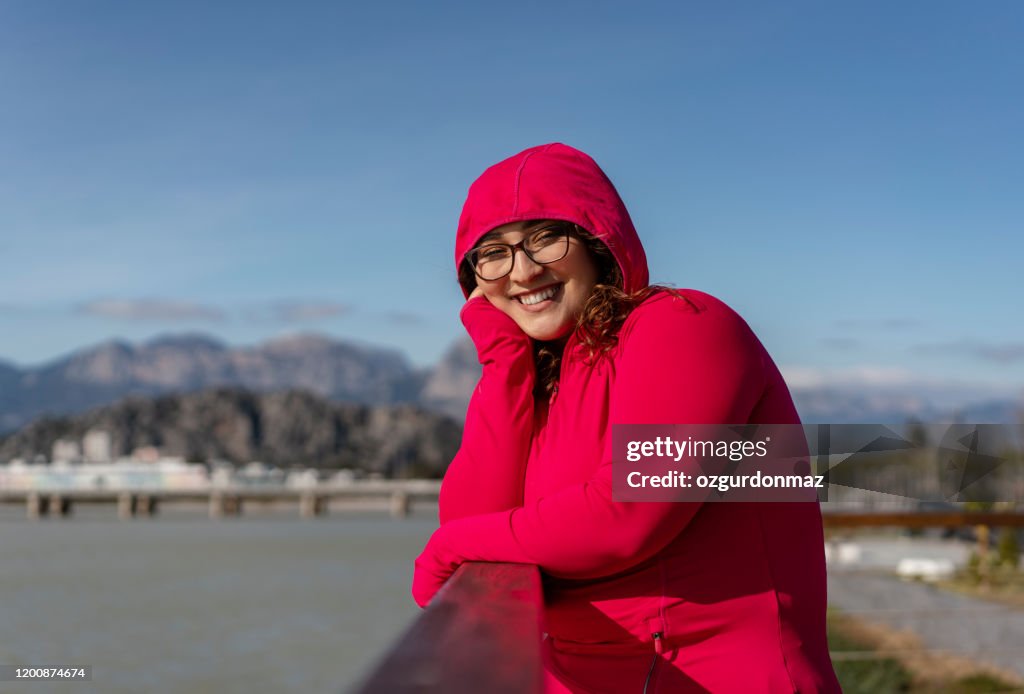 Overweight young woman outdoor portrait