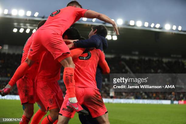 Harry Toffolo of Huddersfield Town and teammates celebrate with Danny Cowley after scoring a goal to make it 1-1 during the Sky Bet Championship...