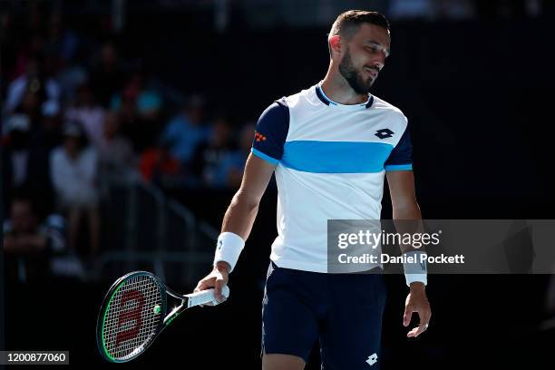 Damir Dzumhur of Bosnia and Herzegovina reacts during his Men's Singles first round match against Stan Wawrinka of Switzerland on day two of the 2020...