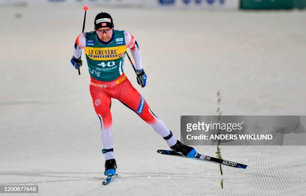 Norway's Sjur Rothe competes in the Mens 15km Freestyle event the FIS Cross-Country World Cup Ski Tour 2020, in Ostersund, Sweden, on February 15,...