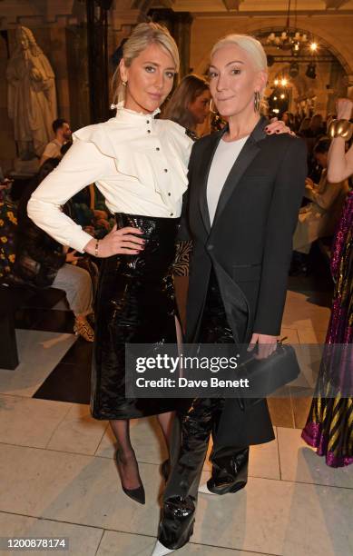 Lady Emily Compton and Olivia Buckingham attend the Halpern show during London Fashion Week February 2020 at The Old Bailey Ceremonial Entrance on...