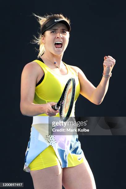 Elina Svitolina of Ukraine celebrates after winning match point during her Women's Singles first round match against Katie Boulter of Great Britain...