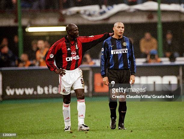 George Weah of AC Milan consoles Ronaldo of Inter Milan after his sending off during the Serie A match at the San Siro in Milan, Italy. \ Mandatory...