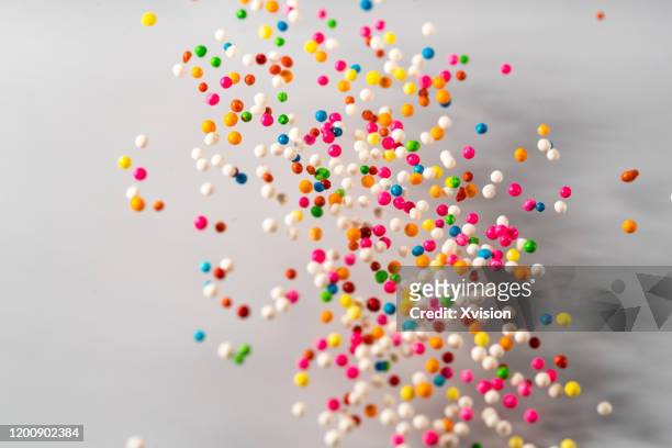 dance colorful sugar ball with vibrant colors - palla sportiva foto e immagini stock