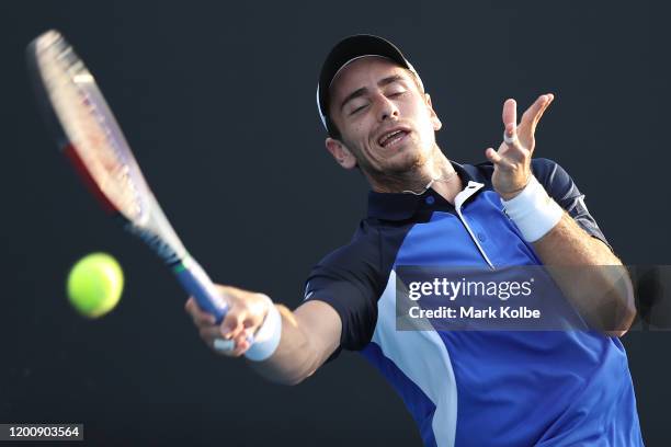 Elliot Benchetrit of France plays a forehand during his Men's Singles first round match against Yuichi Sugita of Japan on day two of the 2020...