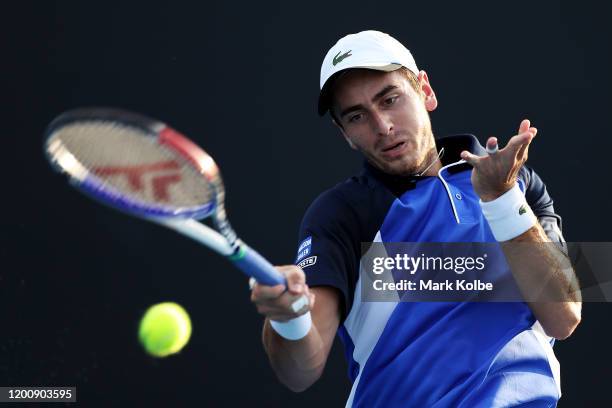 Elliot Benchetrit of France plays a forehand during his Men's Singles first round match against Yuichi Sugita of Japan on day two of the 2020...