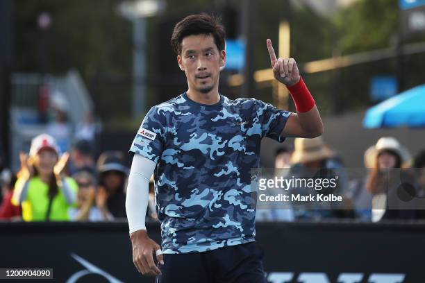 Yuichi Sugita of Japan celebrates winning match point during his Men's Singles first round match against Elliot Benchetrit of France on day two of...