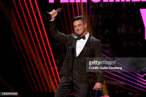 Adult film actor Cade Maddox accepts the Performer of the Year award during the 2020 GayVN Awards show at The Joint inside the Hard Rock Hotel &...