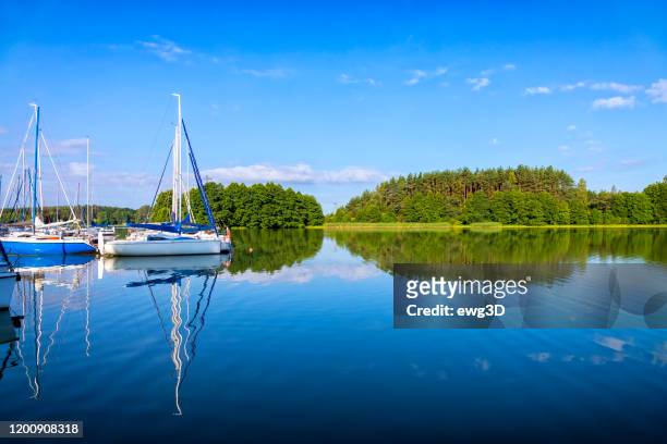 vacation in poland - sailboats on the niegocin lake, masuria - gizycko stock pictures, royalty-free photos & images