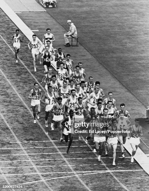 Athletes compete in the Men's 10,000 metres event at the 1964 Summer Olympics in the National Stadium in Tokyo, Japan on 14th October 1964. Eventual...