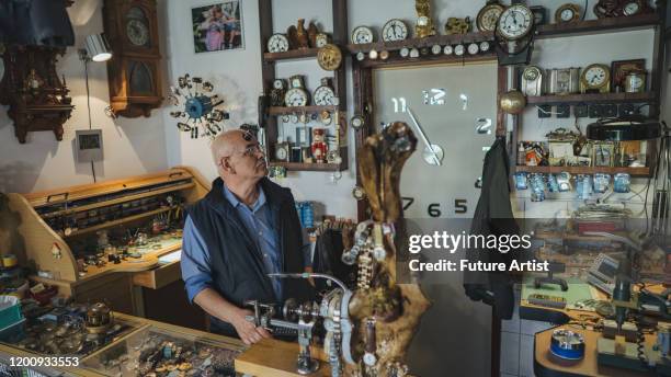 Man Fixing Clock 93 Old Man Fixing Clock Stock Photos, High-Res Pictures, and Images ...