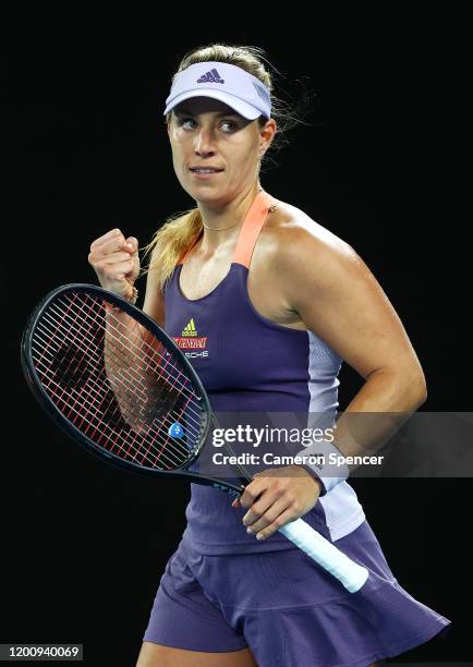 Angelique Kerber of Germany celebrates match point during her Women's Singles first round match against Elisabetta Cocciaretto of Italy on day two of...