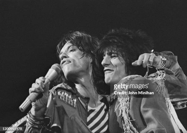 British singer Mick Jagger and British guitarist Ronnie Wood as The Rolling Stones perform at Earls Court, as part of their Tour of Europe '76,...