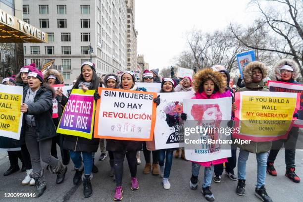 The 4th Annual Women's March gathered at Columbus Circle in NYC, January 18, 2020. This group were all wearing headbands saying "This Is What...