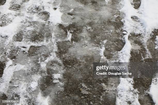 wet slush from melted snow - snösörja bildbanksfoton och bilder