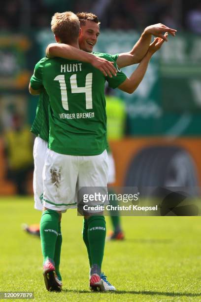 Markus Rosenberg of Bremen celebrates the first goal with Aaron Hunt during the first round DFB Cup match between 1. FC Heidenheim and Werder Bremen...