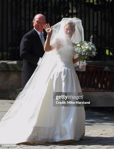 Zara Phillips arrives with her father Captain Mark Phillips for her wedding to Mike Tindall at Canongate Kirk on July 30, 2011 in Edinburgh,...