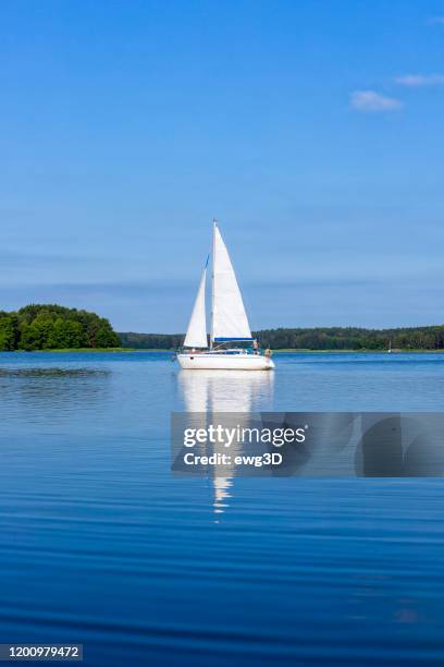 vacation in poland - sailboat on the niegocin lake, masuria - gizycko stock pictures, royalty-free photos & images