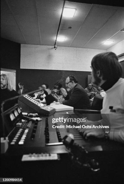 American music producer Jerry Wexler , American recording engineer and producer Tom Dowd and American musician Duane Allman during the recording...