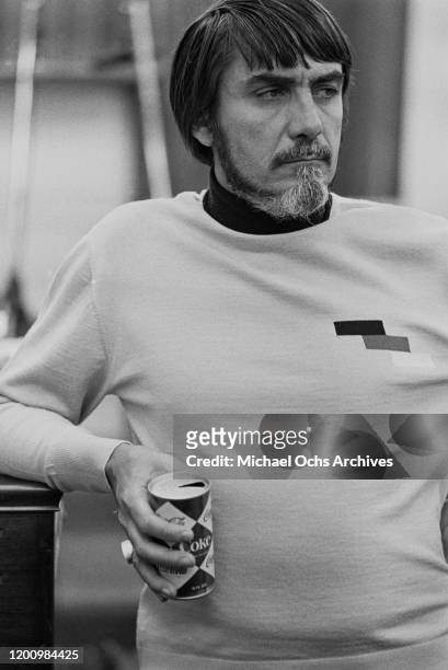 American recording engineer and producer Tom Dowd holding a can of Coke during a recording session of Aretha Franklin's studio album 'This Girl's in...