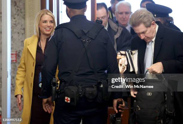 Former Florida Attorney General Pam Bondi arrives with other members of U.S. President Donald Trump's defense team at the U.S. Capitol January 21,...