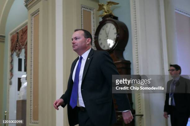 Sen. Mike Lee heads toward the Senate Chamber before the start of President Donald Trump's impeachment trial at the U.S. Capitol January 21, 2020 in...