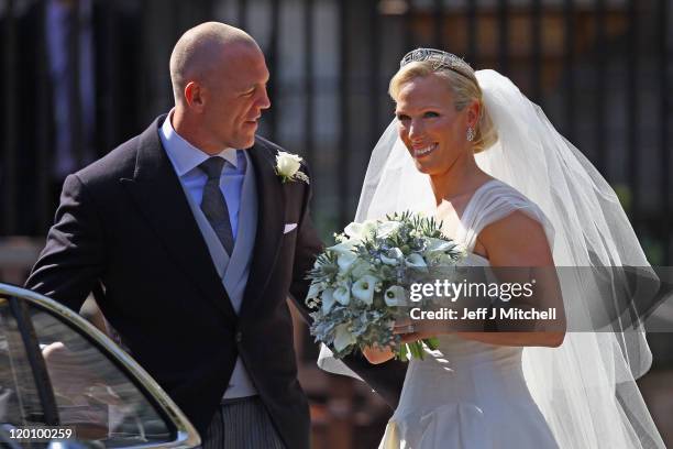 Mike Tindall and Zara Phillips depart after their Royal wedding at Canongate Kirk on July 30, 2011 in Edinburgh, Scotland. The Queen's granddaughter...