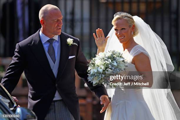 Mike Tindall and Zara Phillips depart after their Royal wedding at Canongate Kirk on July 30, 2011 in Edinburgh, Scotland. The Queen's granddaughter...