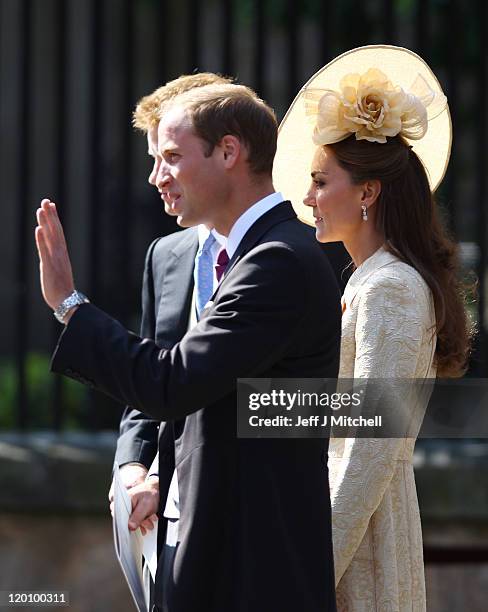 Prince William, Duke of Cambridge and Catherine, Duchess of Cambridge depart after the Royal wedding of Zara Phillips and Mike Tindall at Canongate...