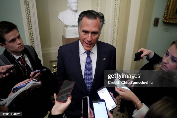 Sen. Mitt Romney talks to reporters before heading into the weekly Senate Republican policy luncheon at the U.S. Capitol January 21, 2020 in...