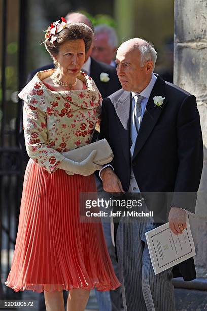 Princess Anne, Princess Royal and Phil Tindall depart from the Royal wedding of Zara Phillips and Mike Tindall at Canongate Kirk on July 30, 2011 in...