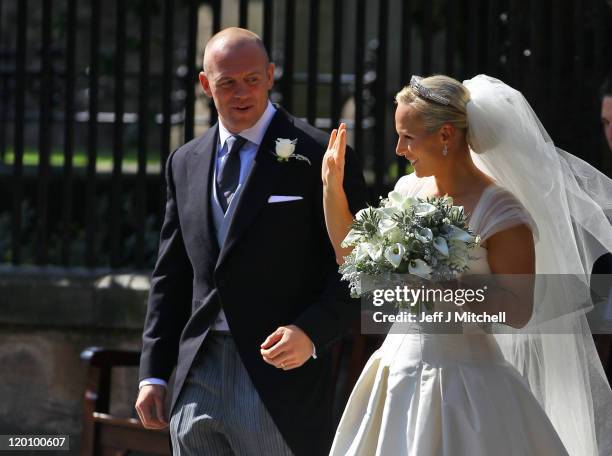 Mike Tindall and Zara Phillips depart after their Royal wedding at Canongate Kirk on July 30, 2011 in Edinburgh, Scotland. The Queen's granddaughter...