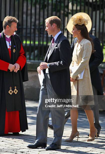 Reverend Neil Gardner, Prince William, Duke of Cambridge and Catherine, Duchess of Cambridge depart after the Royal wedding of Zara Phillips and Mike...