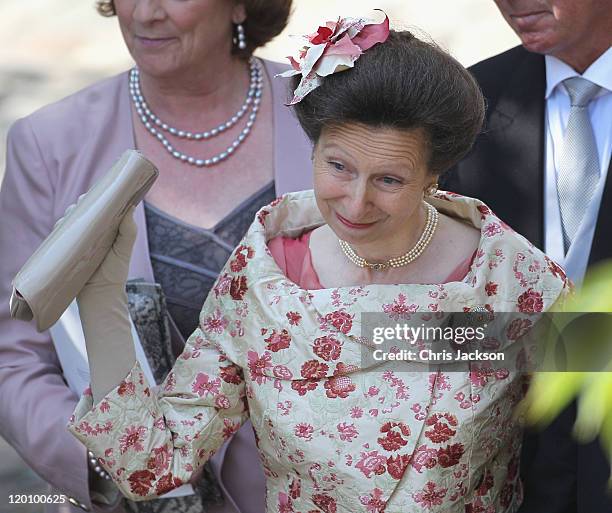 Princess Anne, Princess Royal waves off Zara Philips as she eaves Canongate Kirk on the afternoon of her wedding to Mike Tindall on July 30, 2011 in...
