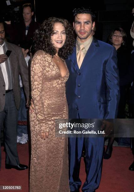 Actress Jennifer Lopez and husband Ojani Noa attend the "Anaconda" Westwood Premiere on April 7, 1997 at Mann Village Theatre in Westwood, California.